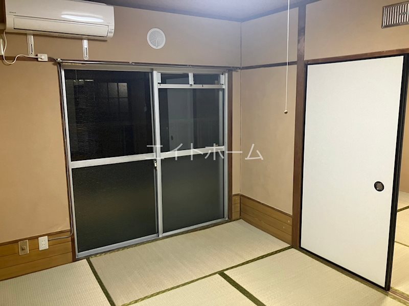 �����s�����q�s���쒬�̃}���V�����̐Q��