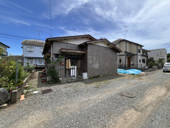 �����s�����q�s�z�K���̓y�n�̑O�ʓ��H�܂ތ��n�ʐ^