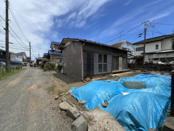 �����s�����q�s�z�K���̓y�n�̑O�ʓ��H�܂ތ��n�ʐ^